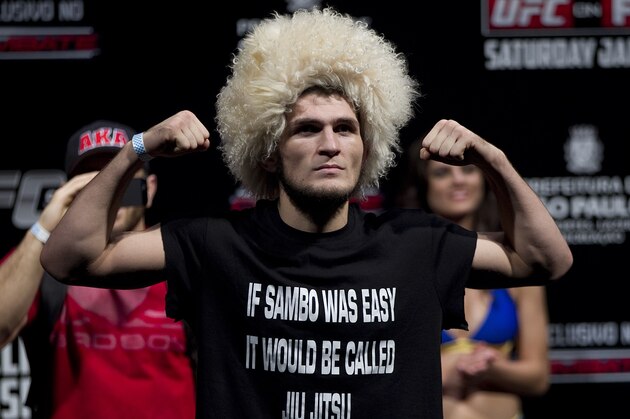 Fighter Khabib Nurmagomedov from the US gestures as he weighs-in for the Ultimate Fighting Championship, UFC, in Sao Paulo, Brazil, Friday, Jan. 18, 2013. Nurmagomedov will compete in UFC in Sao Paulo on Jan. 19. (AP Photo/Andre Penner)