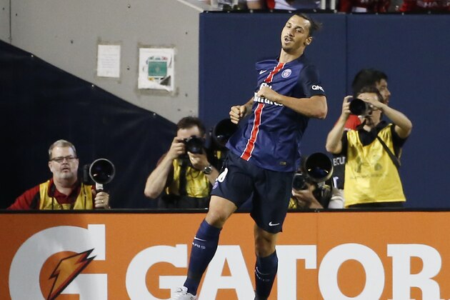 Paris Saint-Germain forward Zlatan Ibrahimovic reacts after scoring against the Manchester United in the first half of an International Champions Cup soccer match on Wednesday, July 29, 2015, in Chicago. (AP Photo/Kamil Krzaczynski)