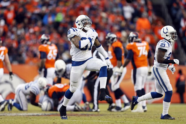 Indianapolis Colts linebacker Jonathan Newsome (91) celebrates a fumble recovery against the Denver Broncos during the first half of an NFL divisional playoff football game, Sunday, Jan. 11, 2015, in Denver. (AP Photo/Joe Mahoney)