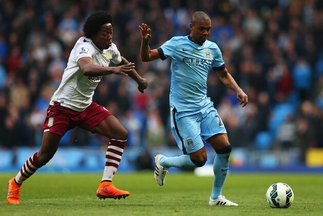 MANCHESTER, ENGLAND - APRIL 25:  Carlos Sanchez of Aston Villa challenges Fernandinho of Manchester City during the Barclays Premier League match between Manchester City and Aston Villa at Etihad Stadium on April 25, 2015 in Manchester, England.  (Photo by Alex Livesey/Getty Images)