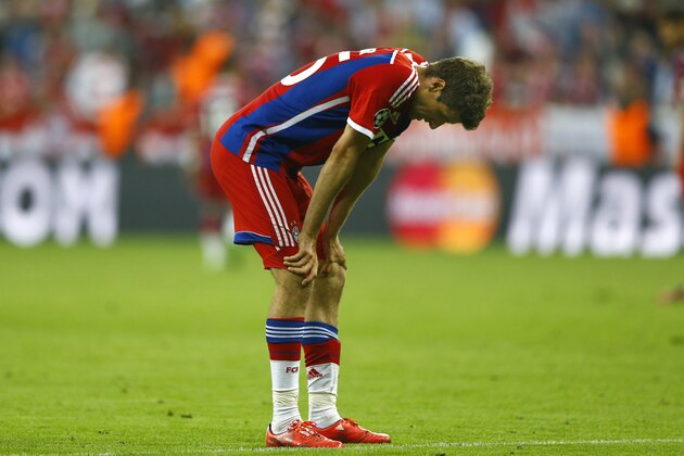 Bayern's Thomas Mueller pauses during the soccer Champions League second leg semifinal match between Bayern Munich and FC Barcelona at Allianz Arena in Munich, southern Germany, Tuesday, May 12, 2015. (AP Photo/Matthias Schrader)