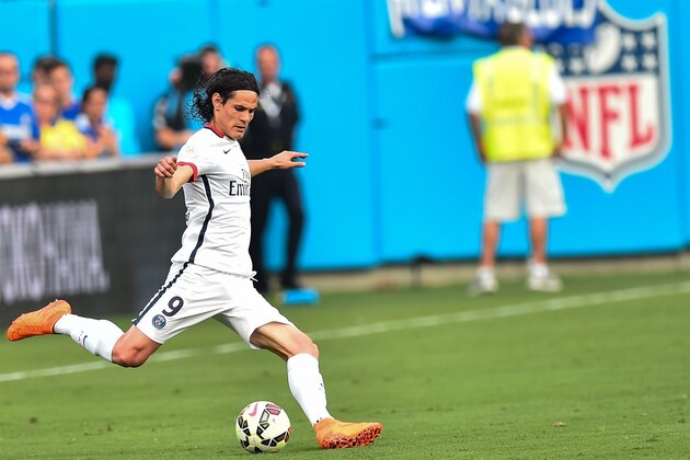 Paris Saint-Germain's Edinson Cavani kicks the ball during an International Champions Cup football match against Chelsea in Charlotte, North Carolina, on July 25, 2015.    AFP PHOTO/NICHOLAS KAMM        (Photo credit should read NICHOLAS KAMM/AFP/Getty Images)