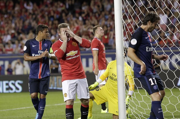 Manchester United forward Wayne Rooney (C) reacts after missing a goal against Paris Saint-Germain during the second half of their International Champions Cup soccer game at Soldier Field in in Chicago, Illinois on July 29, 2015. AFP PHOTO/ JOSHUA LOTT (Photo credit should read Joshua LOTT/AFP/Getty Images) Manchester United forward Wayne Rooney (C) reacts after missing a goal against Paris Saint-Germain during the second half of their International Champions Cup soccer game at Soldier Field in in Chicago, Illinois on July 29, 2015. AFP PHOTO/ JOSHUA LOTT (Photo credit should read Joshua LOTT/AFP/Getty Images)