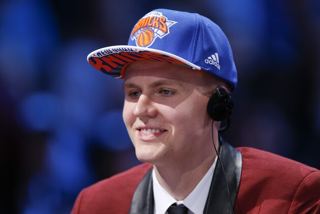Kristaps Porzingis answers questions during an interview after being selected fourth overall by the New York Knicks during the NBA basketball draft, Thursday, June 25, 2015, in New York. (AP Photo/Kathy Willens)
