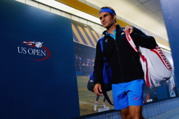 NEW YORK, NY - SEPTEMBER 06:  Roger Federer of Switzerland walks down a hall way to the court prior to a game against Marin Cilic of Croatia in their men's singles semifinal match on Day Thirteen of the 2014 US Open at the USTA Billie Jean King National Tennis Center on September 6, 2014 in the Flushing neighborhood of the Queens borough of New York City.  (Photo by Chris Trotman/Getty Images for USTA)