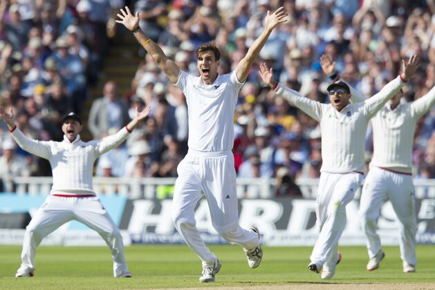 England's Steven Finn, center, appeals unsuccessfully for a catch against Australia's Peter Nevill on the second day of the third Test match of the five match series between England and Australia at Edgbaston cricket ground in Birmingham, England, Thursday, July 30, 2015. (AP Photo/Jon Super)