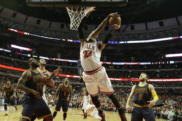 Cleveland Cavaliers forward Tristan Thompson, top, blocks a shot by Chicago Bulls forward Taj Gibson during the second half of Game 6 in a second-round NBA basketball playoff series in Chicago on Thursday, May 14, 2015. The Cavaliers won 94-73. (AP Photo/Nam Y. Huh) Cleveland Cavaliers forward Tristan Thompson, top, blocks a shot by Chicago Bulls forward Taj Gibson during the second half of Game 6 in a second-round NBA basketball playoff series in Chicago on Thursday, May 14, 2015. The Cavaliers won 94-73. (AP Photo/Nam Y. Huh)
