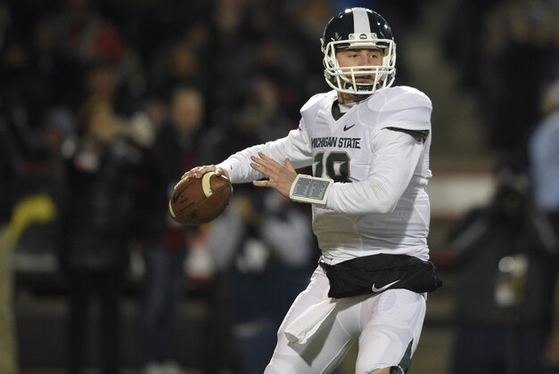 Michigan State quarterback Connor Cook (18) looks to pass during the first half of an NCAA college football game against Maryland, Saturday, Nov. 15, 2014, in College Park, Md. (AP Photo/Nick Wass) Michigan State quarterback Connor Cook (18) looks to pass during the first half of an NCAA college football game against Maryland, Saturday, Nov. 15, 2014, in College Park, Md. (AP Photo/Nick Wass)