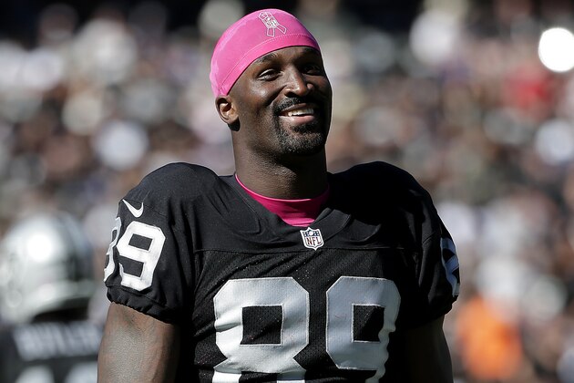 Oakland Raiders wide receiver James Jones (89) smiles during the second quarter of an NFL football game against the San Diego Chargers in Oakland, Calif., Sunday, Oct. 12, 2014. (AP Photo/Marcio Jose Sanchez)