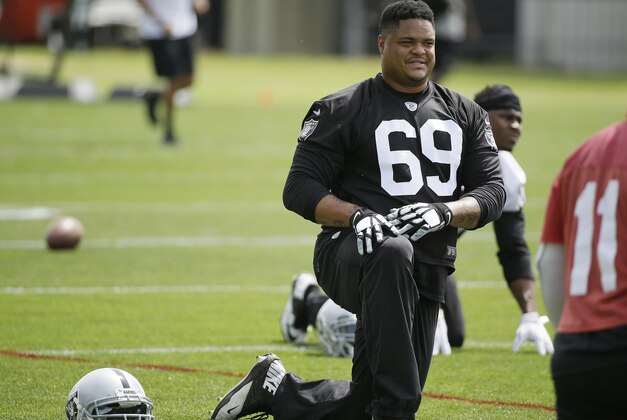Oakland Raiders tackle Khalif Barnes stretches during mini camp at an NFL football facility Tuesday, June 9, 2015, in Alameda, Calif. (AP Photo/Eric Risberg) Oakland Raiders tackle Khalif Barnes stretches during mini camp at an NFL football facility Tuesday, June 9, 2015, in Alameda, Calif. (AP Photo/Eric Risberg)