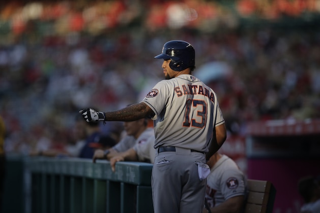 Houston Astros' Domingo Santana walks toward the dugout during the first inning of a baseball game against the Los Angeles Angels, Tuesday, June 23, 2015, in Anaheim, Calif. (AP Photo/Jae C. Hong)