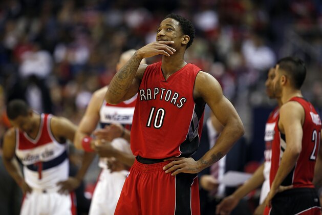 Toronto Raptors guard DeMar DeRozan (10) stands during a break in the first half of Game 4 in the first round of the NBA basketball playoffs against the Washington Wizards,, Sunday, April 26, 2015, in Washington. (AP Photo/Alex Brandon)