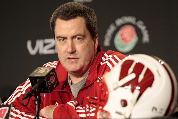 FILE - In this Dec. 28, 2011, file photo, then-Wisconsin offensive coordinator Paul Chryst speaks at a news conference ahead of the Rose Bowl NCAA college football game in Pasadena, Calif. Chryst returned to Wisconsin as head coach to replace Gary Andersen. He takes over a Badgers team that won the Big Ten West title last year. (AP Photo/Jason Redmond, file)