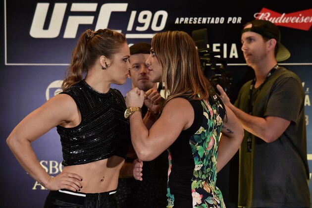 RIO DE JANEIRO, BRAZIL - JULY 30: Bantamweight fighters Ronda Rousey (L) of the United States and Bethe Correia of Brazil face off during Ultimate Media Day at Sheraton Hotel on July 30, 2015 in Rio de Janeiro, Brazil. (Photo by Buda Mendes/Zuffa LLC/Zuffa LLC via Getty Images)