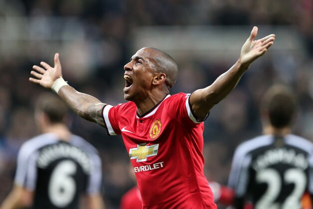Manchester United's Ashley Young celebrates his goal during their English Premier League soccer match between Newcastle United and Manchester United at St James' Park, Newcastle, England, Wednesday, March, 4, 2015. (AP Photo/Scott Heppell)