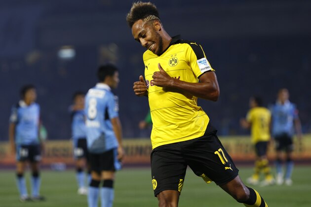 Dortmund's Pierre-Emerick Aubameyang celebrates after scoring a goal against Kawasaki Frontale during their test soccer match in Kawasaki, south of Tokyo, Tuesday, July 7, 2015.(AP Photo/Shuji Kajiyama)