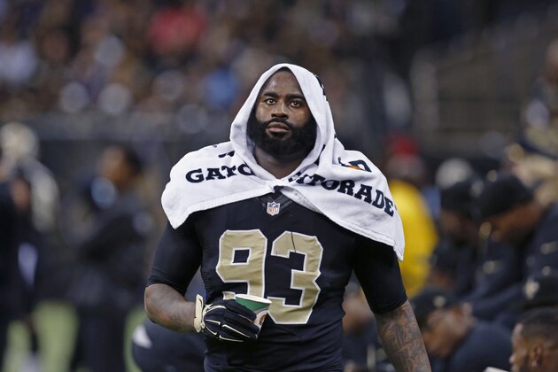 FILE - In this Nov. 24, 2014, file photo, New Orleans Saints outside linebacker Junior Galette walks along the bench during an NFL football game against the Baltimore Ravens in New Orleans.A defense that ranked second-to-last in the NFL last season has cut ties with Galette, who led the club with 10 sacks.  (AP Photo/Jonathan Bachman, File)