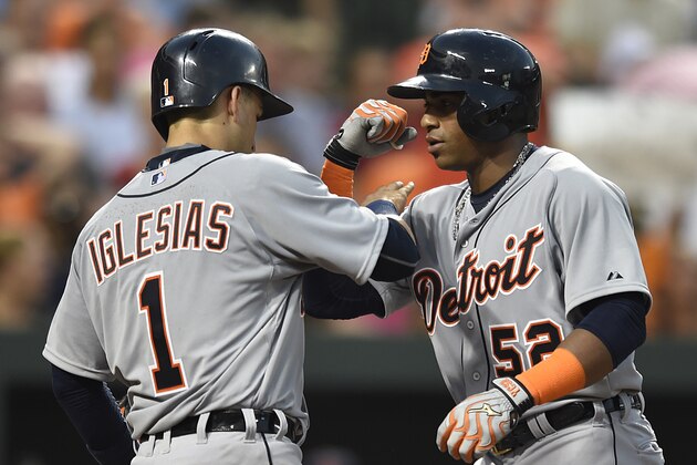 Detroit Tigers' Yoenois Cespedes, right, is congratulated by teammate Jose Iglesias after hitting a two-run home run against the Baltimore Orioles in the fourth inning of a baseball game, Thursday, July 30, 2015, in Baltimore. (AP Photo/Gail Burton) Detroit Tigers' Yoenois Cespedes, right, is congratulated by teammate Jose Iglesias after hitting a two-run home run against the Baltimore Orioles in the fourth inning of a baseball game, Thursday, July 30, 2015, in Baltimore. (AP Photo/Gail Burton)