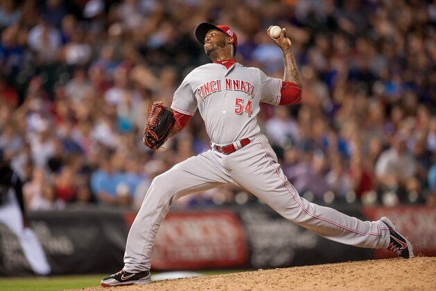 DENVER, CO - JULY 25:  Aroldis Chapman #54 of the Cincinnati Reds pitches against the Colorado Rockies with two outs in the ninth inning of a game at Coors Field on July 25, 2015 in Denver, Colorado.  (Photo by Dustin Bradford/Getty Images)