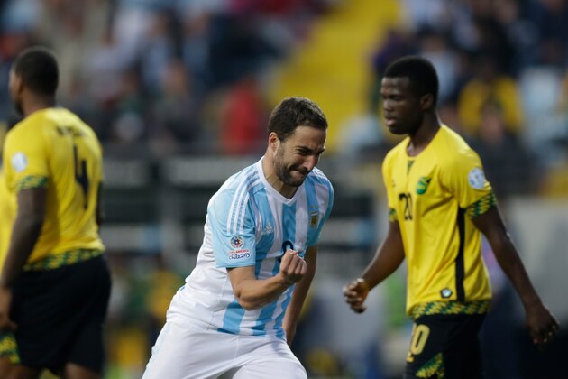 Argentina's Gonzalo Higuain celebrates after scoring a goal againstJamaica  during a Copa America Group B soccer match at the Sausalito Stadium in Vina del Mar, Chile, Saturday, June 20, 2015. (AP Photo/Jorge Saenz)