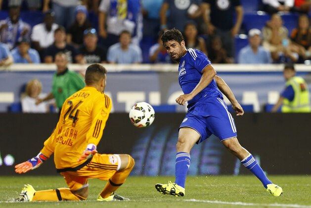 Chelsea FC forward Diego Costa takes a shot past New York Red Bulls goalkeeper Santiago Castano (24) that goes wide of the net in the second half during a soccer match in the International Champions Cup in Harrison N.J., Wednesday, July 22, 2015. The Red Bulls defeated Chelsea 4-2. (AP Photo/Rich Schultz)