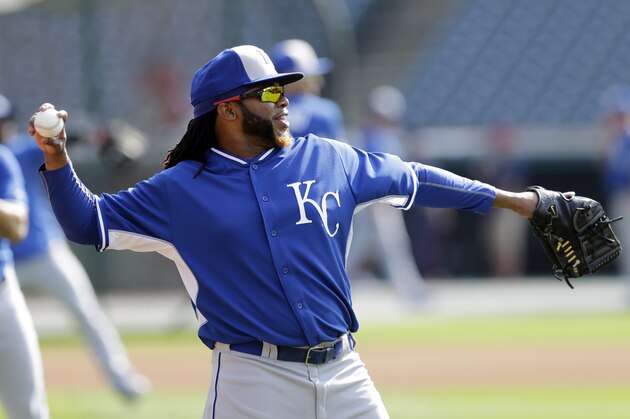 Kansas City Royals' Johnny Cueto warms up before the Royals play the Cleveland Indians in a baseball game, Tuesday, July 28, 2015, in Cleveland. (AP Photo/Tony Dejak)
