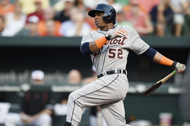 Detroit Tigers' Yoenis Cespedes follows through on a single against the Baltimore Orioles in the first inning of a baseball game, Thursday, July 30, 2015, in Baltimore.(AP Photo/Gail Burton)