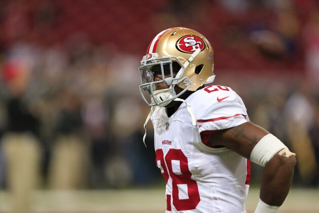 San Francisco 49ers running back Carlos Hyde warms up before an NFL football game against the St. Louis Rams Monday, Oct. 13, 2014, in St Louis. (AP Photo/Billy Hurst)