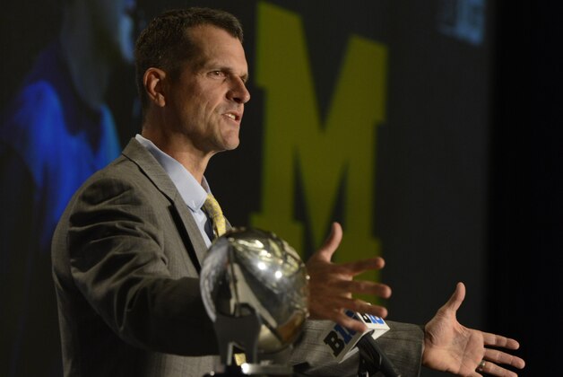 Michigan head coach Jim Harbaugh speaks to the media during the NCAA college Big Ten Football Media Day Friday, July 31, 2015 in Chicago. (AP Photo/Paul Beaty)