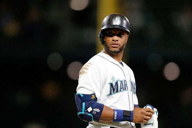 Seattle Mariners' Robinson Cano heads to first on a walk against the Arizona Diamondbacks during a baseball game on Monday, July 27, 2015, in Seattle. (AP Photo/John Froschauer)