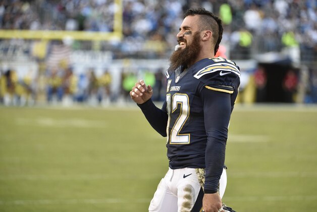 San Diego Chargers free safety Eric Weddle (32) laughs on the sidelines during the fourth quarter of an NFL football game against the Oakland Raiders Sunday, Nov. 16, 2014, in San Diego.  (AP Photo/Denis Poroy)