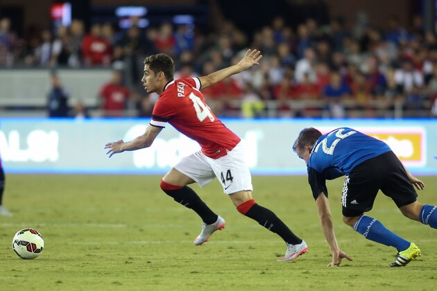 IMAGE DISTRIBUTED FOR INTERNATIONAL CHAMPIONS CUP - Andreas Pereira (44) of Manchester United wins possession over Tommy Thompson (22) of the San Jose Earthquakes at the Avaya Stadium in the second half of the International Champions Cup North America between the San Jose Earthquakes and visiting Manchester United, on Tuesday, July 21, 2015, in San Jose, California. Manchester United lead 3-1 at the 77th minute. (Tomas Ovalle/AP Images for International Champions Cup)