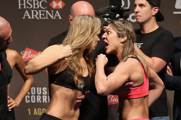 RIO DE JANEIRO, BRAZIL - JULY 31:  (L-R) 
UFC Bantamweight Champion Ronda Rousey of the United States and Bethe Correia of Brazil face off during their UFC 190 weigh-in at HSBC Arena on July 31, 2015 in Rio de Janeiro, Brazil.  (Photo by Matthew Stockman/Getty Images)