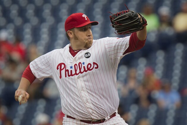 Philadelphia Phillies starting pitcher Aaron Harang throws in the first inning of a baseball game against the Atlanta Braves, Thursday, July 30, 2015, in Philadelphia. (AP Photo/Laurence Kesterson)