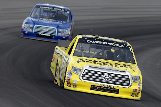 LONG POND, PA - AUGUST 01: Kyle Busch, driver of the #51 Dollar General Toyota, races during the NASCAR Camping World Truck Series Pocono Mountains 150 at Pocono Raceway on August 1, 2015 in Long Pond, Pennsylvania.  (Photo by Tim Bradbury/Getty Images)