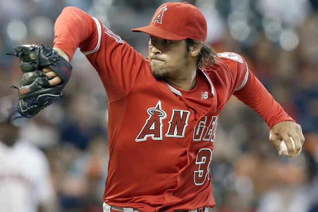 Los Angeles Angels' C.J. Wilson delivers a pitch against the Houston Astros in the first inning of a baseball game Tuesday, July 28, 2015, in Houston. (AP Photo/Pat Sullivan) Los Angeles Angels' C.J. Wilson delivers a pitch against the Houston Astros in the first inning of a baseball game Tuesday, July 28, 2015, in Houston. (AP Photo/Pat Sullivan)