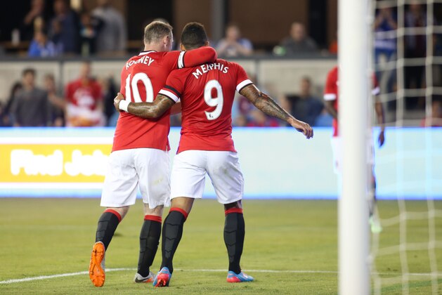 IMAGE DISTRIBUTED FOR INTERNATIONAL CHAMPIONS CUP - Wayne Rooney celebrates the first goal made by Memphis Depay against the San Jose Earthquakes at the Avaya Stadium in the first half of the International Champions Cup North America between the San Jose Earthquakes and visiting Manchester United, on Tuesday, July 21, 2015, in San Jose, California. Manchester United lead 2-1 at the end of the first half. (Tomas Ovalle/AP Images for International Champions Cup)