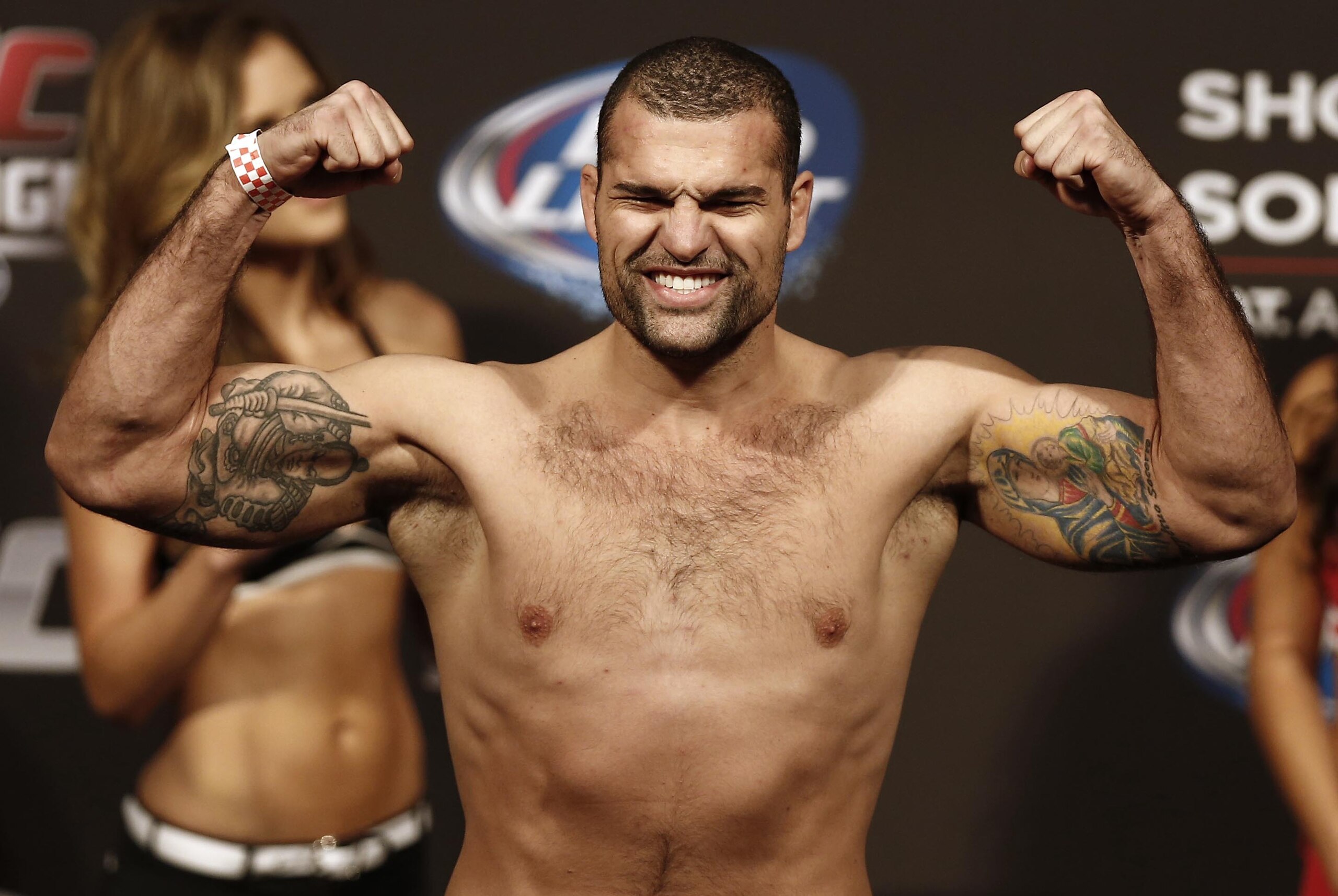 Aug 16, 2013; Boston, MA, USA; Shogun Rua flexes during the weigh-in for his UFC fight at TD Garden. Mandatory Credit: Winslow Townson-USA TODAY Sports