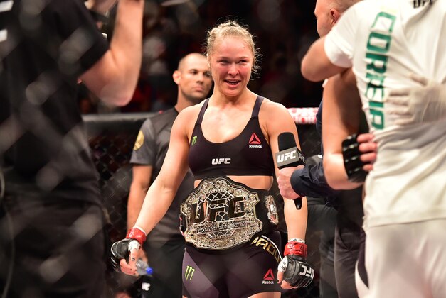 Aug 1, 2015; Rio de Janeiro, RJ, Brazil; Ronda Rousey (red gloves) celebrates after defeating Bethe Correia (not pictured) during UFC 190 at HSBC Arena. Mandatory Credit: Jason Silva-USA TODAY Sports