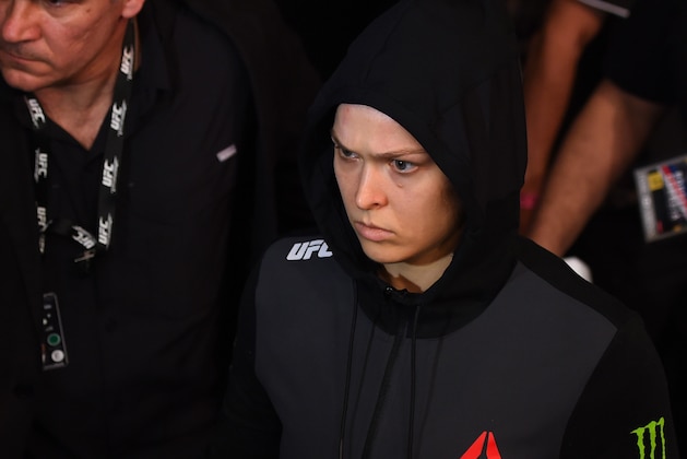 RIO DE JANEIRO, BRAZIL - AUGUST 01:  UFC strawweight champion Ronda Rousey of the United States prepares to enter the Octagon before facing Bethe Correia of Brazil in their UFC women's bantamweight championship bout during the UFC 190 event inside HSBC Arena on August 1, 2015 in Rio de Janeiro, Brazil.  (Photo by Josh Hedges/Zuffa LLC/Zuffa LLC via Getty Images)