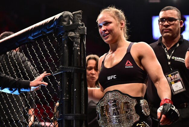 Aug 1, 2015; Rio de Janeiro, RJ, Brazil; Ronda Rousey (red gloves) celebrates after defeating Bethe Correia (not pictured) during UFC 190 at HSBC Arena. Mandatory Credit: Jason Silva-USA TODAY Sports