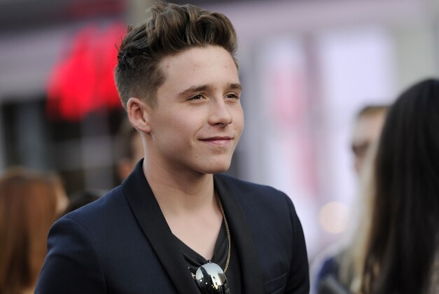 Brooklyn Beckham, son of David and Victoria Beckham, poses at the premiere of the film