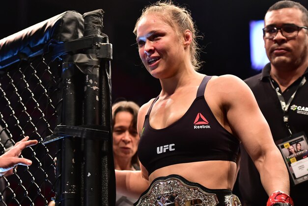 Aug 1, 2015; Rio de Janeiro, RJ, Brazil; Ronda Rousey (red gloves) celebrates after defeating Bethe Correia (not pictured) during UFC 190 at HSBC Arena. Mandatory Credit: Jason Silva-USA TODAY Sports