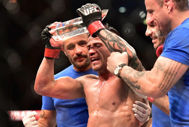 Aug 1, 2015; Rio de Janeiro, Brazil; Reginaldo Vieira (red gloves) reacts after his victory over Dileno Lopes (blue gloves) during UFC 190 at HSBC Arena. Mandatory Credit: Jason Silva-USA TODAY Sports