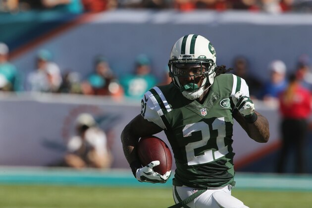 MIAMI GARDENS, FL - DECEMBER 28: Running Back Chris Johnson #21 of the New York Jets has a long run against the Miami Dolphins at Sun Life Stadium on December 28, 2014 in Miami Gardens, Florida. (Photo by Al Pereira/New York Jets/Getty Images)