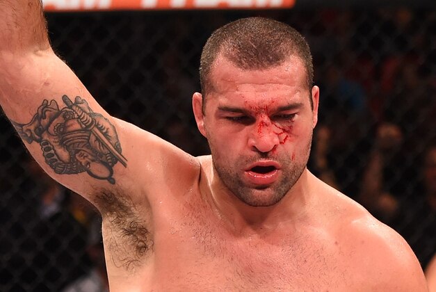RIO DE JANEIRO, BRAZIL - AUGUST 01:  (L-R) Mauricio 'Shogun' Rua of Brazil celebrates his victory over Rogerio Nogueira of Brazil in their light heavyweight bout during the UFC 190 event inside HSBC Arena on August 1, 2015 in Rio de Janeiro, Brazil.  (Photo by Josh Hedges/Zuffa LLC/Zuffa LLC via Getty Images)
