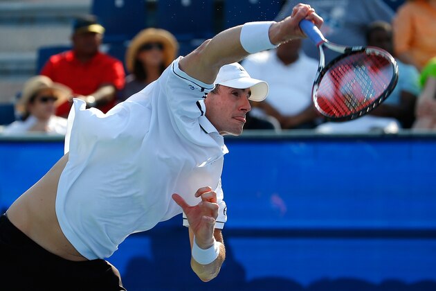 ATLANTA, GA - AUGUST 01:  John Isner serves to Denis Kudla during the BB&T Atlanta Open at Atlantic Station on August 1, 2015 in Atlanta, Georgia.  (Photo by Kevin C. Cox/Getty Images)