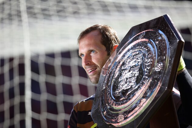 LONDON, ENGLAND -  AUGUST 2:  Goalkeeper Petr Cech of Arsenal with the FA Community Shield trophy after the FA Community Shield match between Chelsea and Arsenal at Wembley Stadium on August 2, 2015 in London, England.  (Photo by Matthew Ashton - AMA/Getty Images)