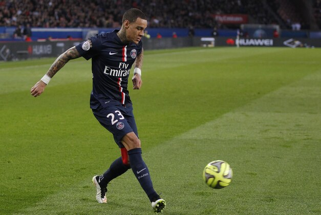 PSG's Dutch Gregory van der Wiel, controls the ball during a League One soccer match Paris Saint Germain against Lens at Parc des Prince stadium in Paris, France, Saturday, March 7, 2015. (AP Photo/Michel Euler)
