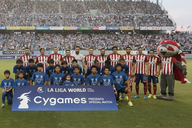 TOSU, JAPAN - AUGUST 01: Players of Atletico Madrid pose for a team photo ahead of the friendly match between Atletico Madrid and Sagan Tosu F.C. at Tosu Stadium on August 1, 2015 in Tosu, Japan.  (Photo by Chris McGrath/Getty Images)